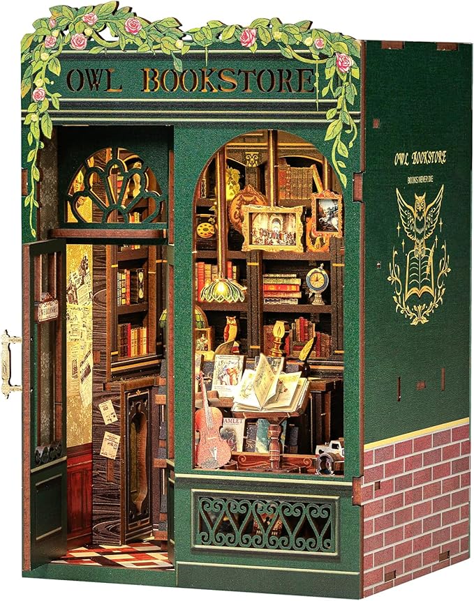 A DIY book nook kit that creates a miniature magical alleyway for a bookshelf.
